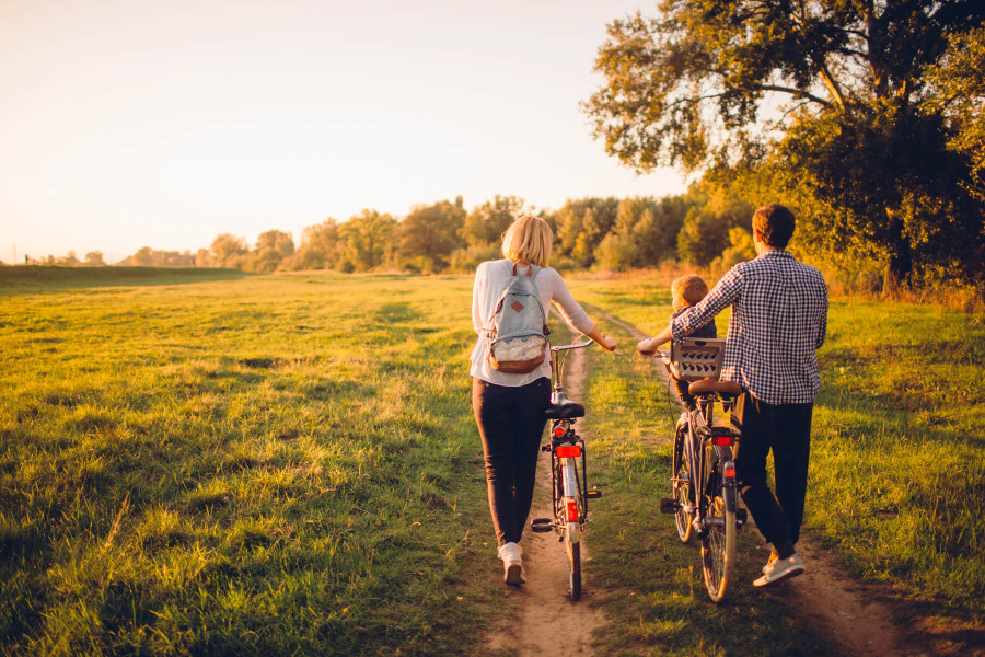 family riding bicycles