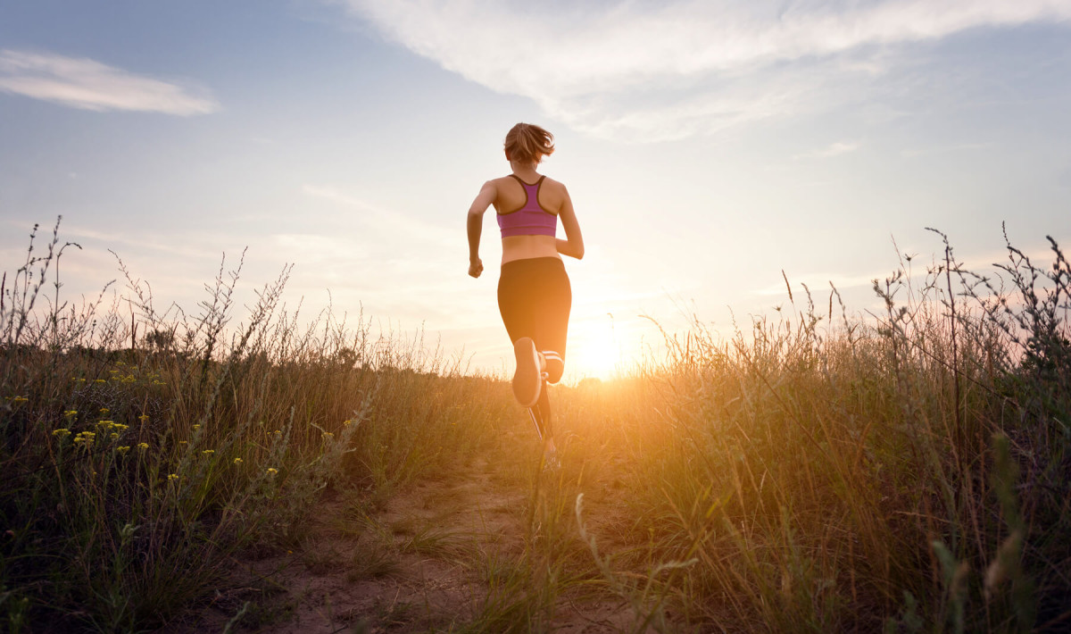 woman running on a trail